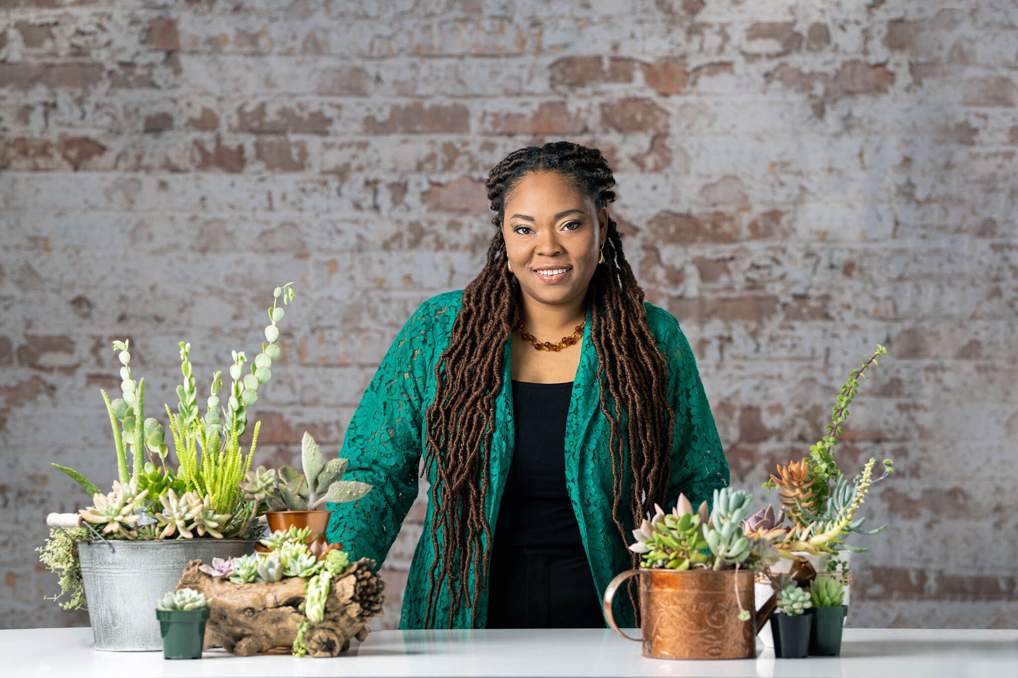 African American women marketing her succulent plant business